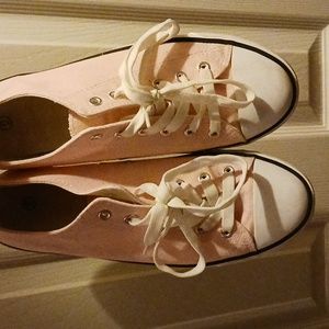 They are a size 11 shoe, and they are light pink